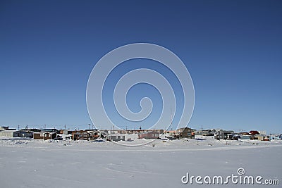 View of Cambridge Bay, Nunavut during a sunny winter day Stock Photo