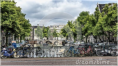 Amsterdam, Netherlands. Bicycles on the bridge Editorial Stock Photo