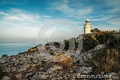 view of the Cap de Sant Antoni Lighthouse in Alicante Province in warm evening light Stock Photo