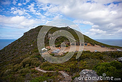 View of Cape Point from hilltop. Flying Dutchman Funicular railway, kiosks, restaurants and parking lot. Stock Photo