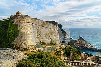 View of Castle Doria and Church of St. Peter in Portovenere or Porto Venere town on Ligurian coast. Italy Stock Photo