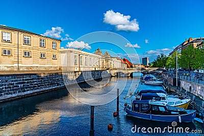 View of a channel next to the Christiansborg Slot Palace in Copenhagen, Denmark Editorial Stock Photo