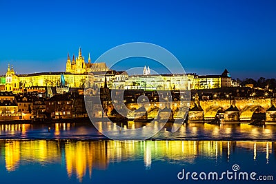 View of Charles Bridge, Prague Castle and Vltava river in Prague, Czech Republic during blue hour twilight sunset Stock Photo