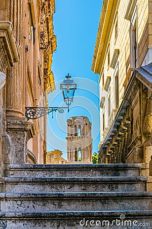 View of chiesa santa maria dell ammiraglio through a narrow street in Palermo, Sicily, Italy Stock Photo