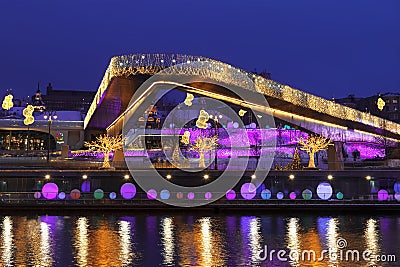 View of Christmas Moscow with a soaring bridge over the Moscow river, new year installations in the form of glowing trees and colo Editorial Stock Photo