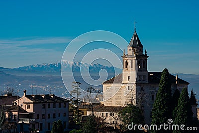 View of the Church of Santa Maria de la Alhambra from Generalife Gardens Stock Photo