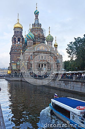 View of the Church of the Savior on Spilled Blood from the Griboyedov Canal in the center of St. Petersburg Editorial Stock Photo
