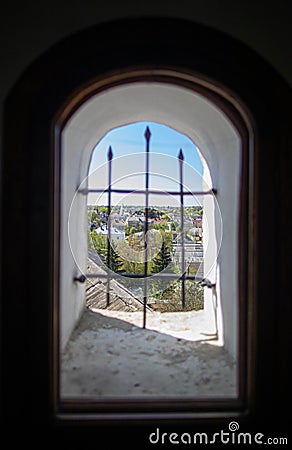 View of the city through the arch window Stock Photo