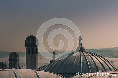 View of city Istanbul, Bosphorus bridge from Galata tower. Outer view of dome in Ottoman architecture. Stock Photo