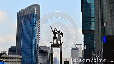 View of the city of Jakarta from a height monument selamat datang Editorial Stock Photo