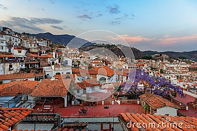 View of the city on the slopes of the mountains. Colonial architecture, tiled roofs Stock Photo