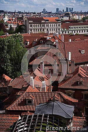 view of the city, top view, visible red roofs of tiles. Sunny weather, Stock Photo
