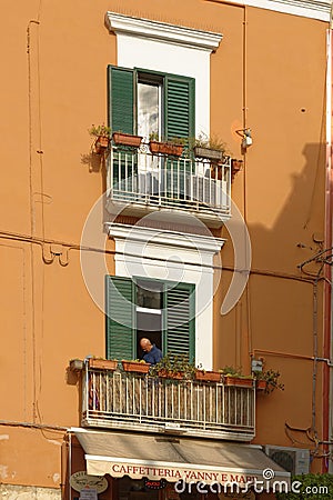 Classic apartment exterior with wrought-iron balconies Editorial Stock Photo