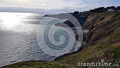 View from cliffs to the sea with sunbeams Stock Photo