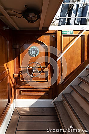 Tall ship and antique anti flood door Stock Photo