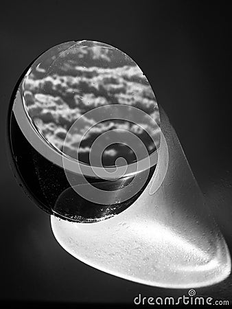 A view of clouds in black and white from a window in an airplane Stock Photo