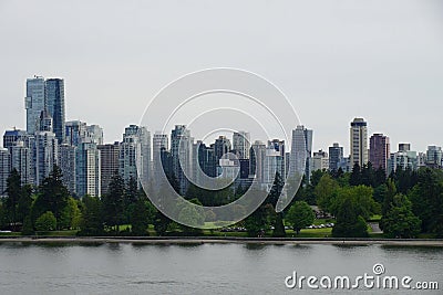 A view of Coal Harbor through Seawall Water Walk, Vancouver, Canada Stock Photo