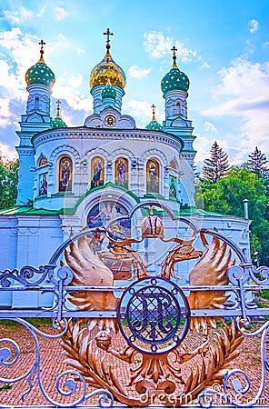 The coat of arms of Russian Empire and the Saint Sampson Church on Poltava Battle field, Ukraine Stock Photo