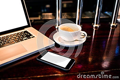 View of coffee, smartphone and laptop Stock Photo