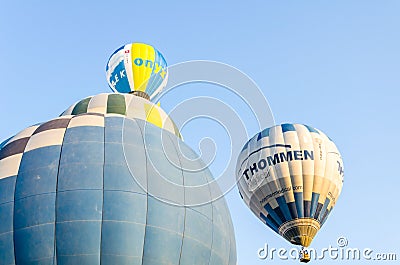 View of the colorful air balloons flying under the blue sky during the European festival Editorial Stock Photo