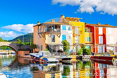 View Of Colorful Houses And Boats In Port Grimaud During Summer Day-Port Grimaud, France Stock Photo