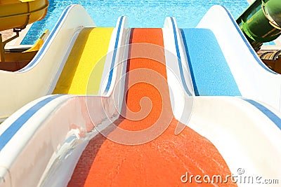 View from colorful slides in water park on day Stock Photo