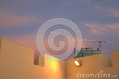 View of colorful wall, building, and sky Stock Photo