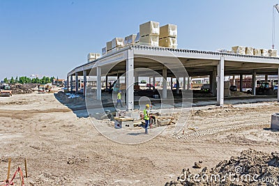 View on construction site, unfinished modern mega market. Architecture concept. Editorial Stock Photo