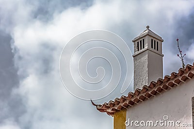 View of cornice and upper corner of building facade, traditional chimney Stock Photo