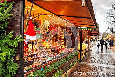 View of the counter with Christmas souvenirs at the Christmas Market Weihnachtsmarkt Editorial Stock Photo