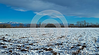 View of the countryside with a bit of snow Stock Photo