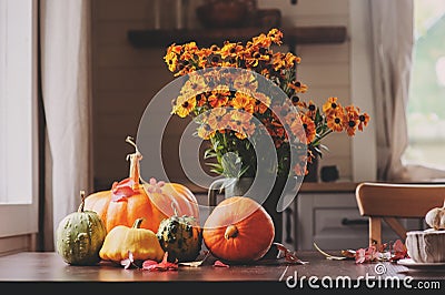 view of cozy autumn breakfast at country house with tea, bagel and seasonal decorations Stock Photo