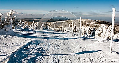View of crosscountry skiing way and mount Serak Stock Photo
