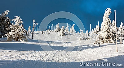 View of crosscountry skiing way and mount Serak Stock Photo