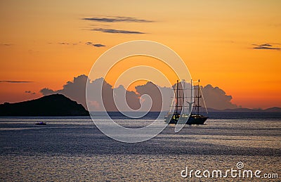 View of cruise sailing ship at sunset Stock Photo