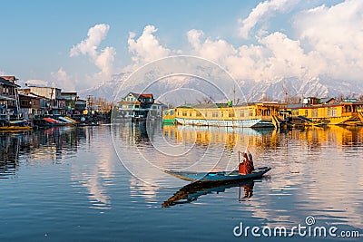 View of Dal lake and boat house before sunset in the heart of Srinagar during winter , Srinagar , Kashmir , India Editorial Stock Photo