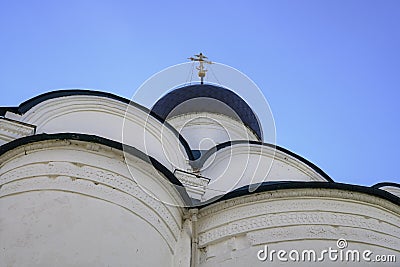 The dome and cross of the 16th century Trinity Cathedral in Alexandrovskaya Sloboda in Alexandrov, Russia Stock Photo