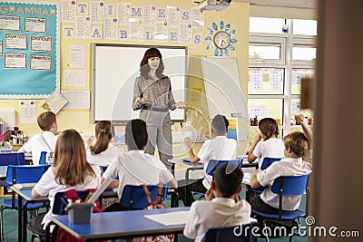 View from doorway of teacher taking primary school class Stock Photo