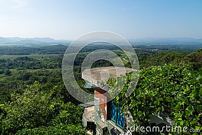 View from the Dora Observatory in the DMZ to North Korea Propaganda village and Kaesong with observation post bunker Stock Photo