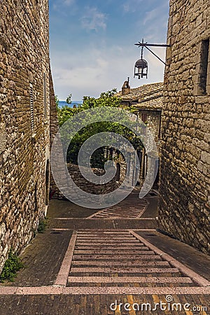 A view down a street on Mount Subasio in Assisi, Umbria Stock Photo