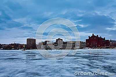 View of downtown Madison, the red gym and several other buildings from frozen lake mendota Stock Photo