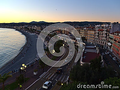 View of the downtown of Nice, France at the French Riviera with famous beach Plage des Ponchettes. Editorial Stock Photo