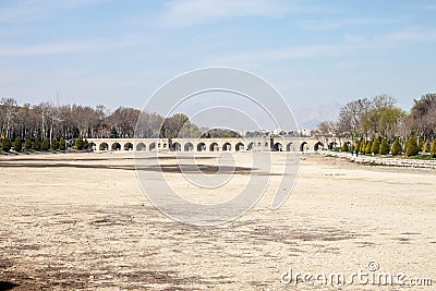View of dry river bed and Chubi bridge Stock Photo