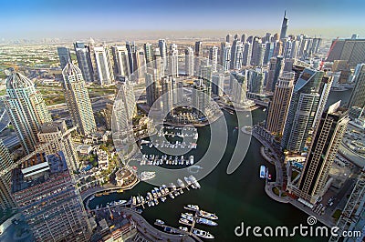 View on Dubai Marina skyscrapers and the most luxury superyacht marina. Dubai, United Arab Emirates Editorial Stock Photo
