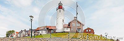 View from the Dutch IJsselmeer at the historic small village of Stock Photo