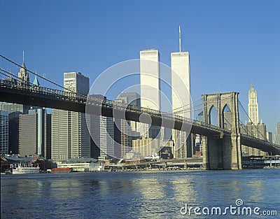 View from East River of the Brooklyn Bridge and skyline in New York City, New York Editorial Stock Photo