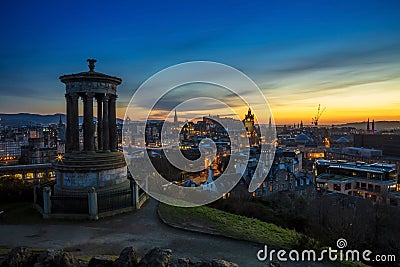 A view of Edinburgh and Dugald Stewart Monument at the sunset Editorial Stock Photo