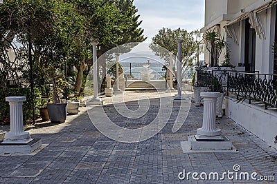 View of the embankment of the city of Loutraki (Greece, Peloponnese) on a sunny day Stock Photo