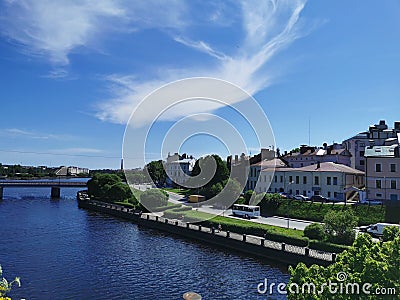 View of the embankment of the city of Vyborg from the wall of the Vyborg Castle against the blue sky Editorial Stock Photo