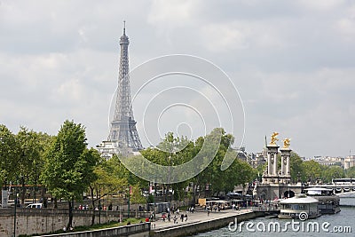 View of the embankment of Orsay. On the waterfront are pedestri Editorial Stock Photo